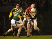 11 February 2006; Graham Canty, Cork, in action against Colm Cooper, left, and Declan O'Sullivan, Kerry. Allianz National Football League, Division 1A, Round 2, Cork v Kerry, Pairc Ui Rinn, Cork. Picture credit: Pat Murphy / SPORTSFILE