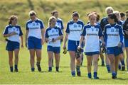 27 April 2014; Dejected Monaghan players, from left, Aoife McAnespie, 7, Ellen McCarron, Ciara McAnespie, Grainne McNally and Therese Scott, leave the pitch after the game. TESCO HomeGrown Ladies National Football League Division 1 Semi-Final, Dublin v Monaghan, Lannleire, Dunleer, Co. Louth. Picture credit: Brendan Moran / SPORTSFILE
