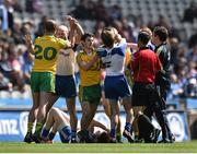 27 April 2014; Players from both sides clash before referee David Gough sent off Donegal's Rory Kavanagh. Allianz Football League Division 2 Final, Donegal v Monaghan, Croke Park, Dublin. Picture credit: David Maher / SPORTSFILE