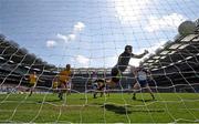 27 April 2014; Monaghan's Kieran Hughes beats Donegal goalkeeper Paul Durcan to score his side's first goal. Allianz Football League Division 2 Final, Donegal v Monaghan, Croke Park, Dublin. Picture credit: David Maher / SPORTSFILE