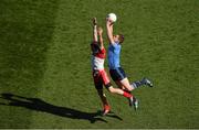 27 April 2014; Kevin Nolan, Dublin, in action against Benny Heron, Derry. Allianz Football League Division 1 Final, Dublin v Derry, Croke Park, Dublin. Picture credit: Ray McManus / SPORTSFILE