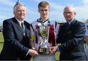 27 April 2014; Galway & District League captain Paul Healy receives the cup from Tony Fitzgerald, left, Vice Chairman of the FAI, Jim McConnell, Chairman FAI Domestic Committee. FAI UMBRO Youth Inter League Cup Final, Wexford Football League v Galway & District League, Ferrycarrig Park, Wexford. Picture credit: Barry Cregg / SPORTSFILE