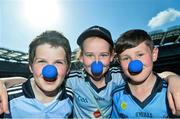 27 April 2014; The GAA today encouraged football supporters to get behind Autism Awareness Month by staging a record-breaking attempt for the greatest number of people wearing a blue nose in one place at half time in the Allianz Division 1 League Football Final. Irish Autism Action is one of the GAA’s charities of choice for 2014. Our picture shows Dublin supporters from left Conor Ryan, age 12, Rebecca Tuite, age 12, and Conor Ryan, age 13, all from Wayside, Co. Dublin, during the world record attempt to help raise awareness for autism. Picture credit: David Maher / SPORTSFILE
