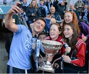 27 April 2014; Paul Flynn, Dublin, takes a selfie with his Fingallians clubmates, Orla Keeling, left, Laura Dempsey, both aged 13, and Emer Keeling, top, aged 11. Allianz Football League Division 1 Final, Dublin v Derry, Croke Park, Dublin. Picture credit: Dáiire Brennan / SPORTSFILE
