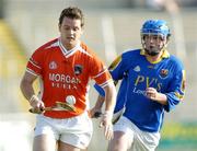 16 July 2005; Paddy McArdle, Armagh, in action against Martin Coyle, Longford. Nicky Rackard Cup, Group C Quarter-Final Play Off, Longford v Armagh, Kingspan Breffni Park, Cavan. Picture credit; Damien Eagers / SPORTSFILE