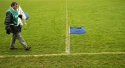 12 February 2006; 'Maor' Declan Black collects the sideline flags after the game. Allianz National Football League, Division 1B, Round 2, Meath v Armagh, Pairc Tailteann, Navan, Co. Meath. Picture credit: Ray McManus / SPORTSFILE