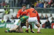 12 February 2006; Martin Doran, Meath, in action against Enda McNulty, 4, and Paul McCormack, Armagh. Allianz National Football League, Division 1B, Round 2, Meath v Armagh, Pairc Tailteann, Navan, Co. Meath. Picture credit: Ray McManus / SPORTSFILE