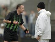 12 February 2006; Referee Aidan Mangan consults with one of his umpires. Allianz National Football League, Division 1B, Round 2, Meath v Armagh, Pairc Tailteann, Navan, Co. Meath. Picture credit: Ray McManus / SPORTSFILE