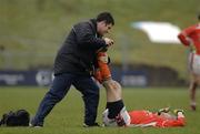 12 February 2006; Chartered physiotherapist Eoghan O'Neill with Armagh player Peadar Toal. Allianz National Football League, Division 1B, Round 2, Meath v Armagh, Pairc Tailteann, Navan, Co. Meath. Picture credit: Ray McManus / SPORTSFILE