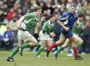 11 February 2006; Brian O'Driscoll, Ireland, races through the French defence. RBS 6 Nations 2006, France v Ireland, Stade de France, Paris, France. Picture credit; Brendan Moran / SPORTSFILE