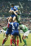11 February 2006; Jerome Thion, France, wins a lineout ahead of Malcolm O'Kelly, Ireland. RBS 6 Nations 2006, France v Ireland, Stade de France, Paris, France. Picture credit; Brendan Moran / SPORTSFILE