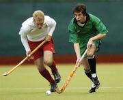 14 February 2006; Chris Gregg, Ireland U18, in action against Simon Harte, England U18. Boys U18 Hockey International, Ireland U18 v England U18, Belfield, Dublin. Picture credit: Damien Eagers / SPORTSFILE