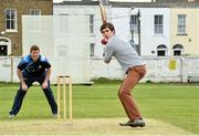 28 April 2014; Newstalk presenter Diarmuid Lyng tests his batting skills watched on by Leinster Lighting's Kevin O'Brien during the announcement of Newstalk FM as the new sponsor for Cricket Ireland Inter-Provincial. Leinster Cricket Club, Observatory Lane, Rathmines, Dublin. Picture credit: David Maher / SPORTSFILE