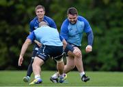 28 April 2014; Leinster's Richardt Strauss, left, and Martin Moore practice a drill during squad training ahead of their Celtic League 2013/14, Round 21, game against Ulster on Friday. Leinster Rugby Squad Training, Rosemount, UCD, Belfield, Dublin. Picture credit: Ramsey Cardy / SPORTSFILE