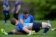 28 April 2014; Leinster's Rob Kearney, top, and Brian O'Driscoll during a drill in squad training ahead of their Celtic League 2013/14, Round 21, game against Ulster on Friday. Leinster Rugby Squad Training, Rosemount, UCD, Belfield, Dublin. Picture credit: Ramsey Cardy / SPORTSFILE