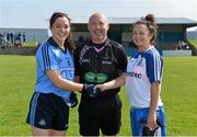 27 April 2014; Team captains Sinead Goldrick, Dublin, and Christina Reilly, Monaghan, shake hands in the company of referee Gus Chapman. TESCO HomeGrown Ladies National Football League Division 1 Semi-Final, Dublin v Monaghan, Lannleire, Dunleer, Co. Louth. Picture credit: Brendan Moran / SPORTSFILE
