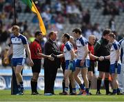 27 April 2014; Members of the Monaghan team shake hands with Uachtarán Chumann Lúthchleas Gael Liam Ó Néill and referee David Gough before the start of the game. Allianz Football League Division 2 Final, Donegal v Monaghan, Croke Park, Dublin. Picture credit: David Maher / SPORTSFILE