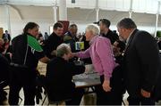 26 April 2014; Members of the Sráid a'Mhuilinn team, Co. Cork, congratulate with the Cnoc na hEaglaise team, Co. Kerry, after the won the Trath na gCeist / Table Quiz competition during the All-Ireland Scór Sinsear Finals 2014, St. Mary's Hall, Galway Mayo Institute of Technology, Castlebar, Co. Mayo. Picture credit: Piaras Ó Mídheach / SPORTSFILE