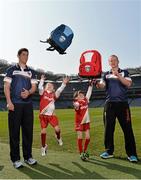 29 April 2014; Rory O' Carroll, Dublin, and Benny Coulter, Down, with Finian Malone, left, age 6, with his brother Caelan, age 4, from Dublin, in attendance at the launch of the Kellogg’s GAA Cúl Camps 2014. Research commissioned by Kellogg’s to celebrate the 2014 launch, found that Gaelic games continue to enjoy huge popularity in Ireland with 73% of families devoting more than 10 hours per month to GAA sports. Croke Park, Dublin. Picture credit: David Maher / SPORTSFILE
