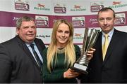 30 April 2014; Julie Ann Russell, Peamount United, is presented with the Bus Eireann Women’s National League  Player of the Year Award by Eamon Naughton, left, Chairman of the SSE Airtricity League, and Martin Nolan, Chief Executive of Bus Eireann. Bus Eireann Women’s National League Awards, Aviva Stadium, Lansdowne Road, Dublin. Picture credit: David Maher / SPORTSFILE