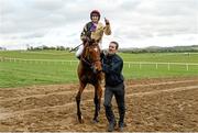 30 April 2014; Jockey Jamie Codd celebrates on Shaneshill after winning the Attheraces.com Champion I.N.H. Flat Race. Punchestown Racecourse, Punchestown, Co. Kildare. Picture credit: Barry Cregg / SPORTSFILE