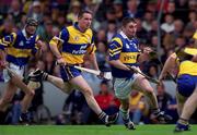 6 June 1999; Paul Shelly of Tipperary in action against Colin Lynch of Clare during the Guinness Munster Senior Hurling Championship semi-final match between Clare and Tipperary at Páirc Uí Chaoimh in Cork. Photo by Ray McManus/Sportsfile