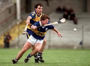 29 May 1994; Michael Cleary of Tipperary in action against Stephen Sheddy of Clare during the Munster Senior Hurling Championship quarter-final match between Tipperary and Clare at the Gaelic Grounds in Limerick. Photo by Brendan Moran/Sportsfile