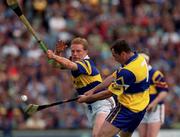 6 June 1999; Anthony Daly of Clare in action against Declan Ryan of Tipperary during the Guinness Munster Senior Hurling Championship semi-final match between Clare and Tipperary at Páirc Uí Chaoimh in Cork. Photo by Ray McManus/Sportsfile