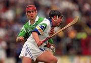30 May 1999; Anthony Kirwan of Waterford in action against TJ Ryan of Limerick during the Guinness Munster Senior Hurling Championship quarter-final match between Limerick and Waterford at Páirc Uí Chaoimh in Cork. Photo by Ray McManus/Sportsfile