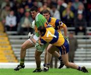 20 June 1999; Aodán MacGearailt of Kerry in action against Barry Keating of Clare during the Bank of Ireland Munster Senior Football Championship semi-final match between Kerry and Clare at Fitzgerald Stadium in Killarney, Kerry. Photo by Brendan Moran/Sportsfile