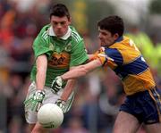 20 June 1999; Aodán MacGearailt of Kerry in action against Niall Hawes of Clare during the Bank of Ireland Munster Senior Football Championship semi-final match between Kerry and Clare at Fitzgerald Stadium in Killarney, Kerry. Photo by Brendan Moran/Sportsfile