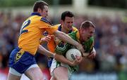 30 May 1999; Brendan Guckian of Leitrim in action against Eddie Lohan, left, and Ciaran Heneghan of Roscommon during the Bank of Ireland Connacht Senior Football Championship quarter-final match between Leitrim and Roscommon at Páirc Seán Mac Diarmada in Carrick-on-Shannon, Leitrim. Photo by Brendan Moran/Sportsfile