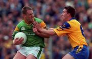 30 May 1999; Brendan Guckian of Leitrim in action against Clifford McDonald of Roscommon during the Bank of Ireland Connacht Senior Football Championship quarter-final match between Leitrim and Roscommon at Páirc Seán Mac Diarmada in Carrick-on-Shannon, Leitrim. Photo by Brendan Moran/Sportsfile