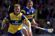 6 June 1999; Brian Lohan of Clare in action against Paul Shelby of Tipperary during the Guinness Munster Senior Hurling Championship semi-final match between Clare and Tipperary at Páirc Uí Chaoimh in Cork. Photo by Ray McManus/Sportsfile