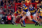 6 June 1999; Brian Quinn of Clare in action against Declan Ryan of Tipperary during the Guinness Munster Senior Hurling Championship semi-final match between Clare and Tipperary at Páirc Uí Chaoimh in Cork. Photo by Ray McManus/Sportsfile