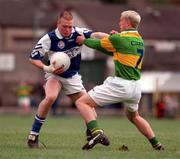9 May 1998; (EDITORS NOTE: Please note that since this picture was taken, Martin was killed in a car accident.) Chris Conway of Laois in action against Martin Beckett of Kerry during the GAA Football All-Ireland U21 Championship Final match between Kerry and Laois at the Gaelic Grounds in Limerick. Photo by Brendan Moran/Sportsfile