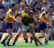 30 May 1999; Christopher Carroll of Leitrim in action against Derek Duggan, left, and Clifford McDonald of Roscommon during the Bank of Ireland Connacht Senior Football Championship quarter-final match between Leitrim and Roscommon at Páirc Seán Mac Diarmada in Carrick-on-Shannon, Leitrim. Photo by Brendan Moran/Sportsfile