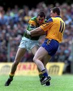 30 May 1999; Christopher Carroll of Leitrim in action against Derek Duggan of Roscommon during the Bank of Ireland Connacht Senior Football Championship quarter-final match between Leitrim and Roscommon at Páirc Seán Mac Diarmada in Carrick-on-Shannon, Leitrim. Photo by Brendan Moran/Sportsfile