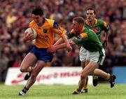 30 May 1999; Conor Connelly of Roscommon in action against Padraig Flynn of Leitrim during the Bank of Ireland Connacht Senior Football Championship quarter-final match between Leitrim and Roscommon at Páirc Seán Mac Diarmada in Carrick-on-Shannon, Leitrim. Photo by Brendan Moran/Sportsfile
