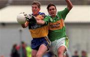 20 June 1999; Conor Whelan of Clare in action against Maurice Fitzgerald of Kerry during the Bank of Ireland Munster Senior Football Championship semi-final match between Kerry and Clare at Fitzgerald Stadium in Killarney, Kerry. Photo by Brendan Moran/Sportsfile