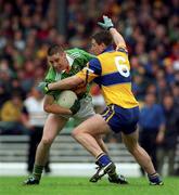 20 June 1999; Darragh Ó Sé of Kerry in action against Brendan Rouine of Clare during the Bank of Ireland Munster Senior Football Championship semi-final match between Kerry and Clare at Fitzgerald Stadium in Killarney, Kerry. Photo by Brendan Moran/Sportsfile