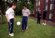 28 May 1999; A benefit night for former Irish International soccer star Dave Langan, who is now registered as disabled in the UK as a result of injuries picked up while playing for the Republic of Ireland, will be held at Cherry Orchard Football Club in Ballyfermot, Dublin on Monday, June 14th. Pictured are Alan Maubury, left, who makes his debut for the Republic of Ireland senior team against Northern Ireland at Lansdowne Road, and Stephen Carr as captain Niall Quinn chats with Dave Langan. Photo by Brendan Moran/Sportsfile