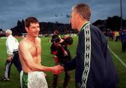 9 June 1999; Republic of Ireland manager Mick McCarthy shakes hands with Denis Irwin following the UEFA European Championships Qualifier match between Republic of Ireland and FYR Macedonia at Lansdowne Road in Dublin. Photo by David Maher/Sportsfile