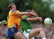 30 May 1999; Fergal O'Donnell of Roscommon in action against Brendan Guckian of Leitrim during the Bank of Ireland Connacht Senior Football Championship quarter-final match between Leitrim and Roscommon at Páirc Seán Mac Diarmada in Carrick-on-Shannon, Leitrim. Photo by Brendan Moran/Sportsfile