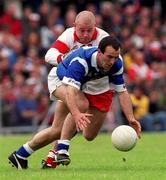 20 June 1999; Gavin Hartin of Cavan in action against Geoffrey McGonagle of Derry during the Bank of Ireland Ulster Senior Football Championship quarter-final match between Derry and Cavan at Casement Park in Belfast. Photo by David Maher/Sportsfile