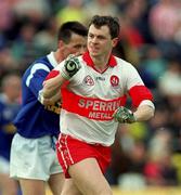 20 June 1999; Joe Brolly of Derry celebrates a point during the Bank of Ireland Ulster Senior Football Championship quarter-final match between Derry and Cavan at Casement Park in Belfast. Photo by David Maher/Sportsfile