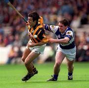 20 June 1999; Ken O'Shea of Kilkenny is tackled by Seamus Dooley of Laois during the Guinness Leinster Senior Hurling Championship semi-final match between Kilkenny and Laois at Croke Park in Dublin. Photo by Ray McManus/Sportsfile