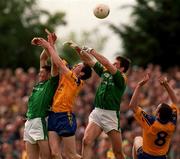 30 May 1999; Paul McDermott, left, and Jason Ward of Leitrim in action against Stephen Lohan, left, and Tom Ryan of Roscommon during the Bank of Ireland Connacht Senior Football Championship quarter-final match between Leitrim and Roscommon at Páirc Seán Mac Diarmada in Carrick-on-Shannon, Leitrim. Photo by Brendan Moran/Sportsfile