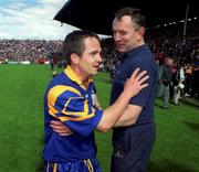 6 June 1999; Davy Fitzgerald of Clare with trainer Michael McNamara following the Guinness Munster Senior Hurling Championship semi-final match between Clare and Tipperary at Páirc Uí Chaoimh in Cork. Photo by Ray McManus/Sportsfile