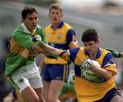 20 June 1999; Niall Hawes of Clare in action against Maurice Fitzgerald of Kerry during the Bank of Ireland Munster Senior Football Championship semi-final match between Kerry and Clare at Fitzgerald Stadium in Killarney, Kerry. Photo by Brendan Moran/Sportsfile